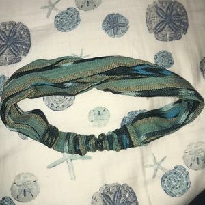 blue green headband that can expand into a mask
